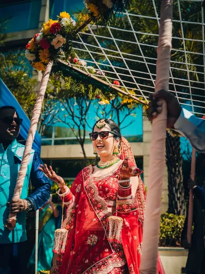 The joyful entrance of a bride, laughing and dancing her way into the ceremony.