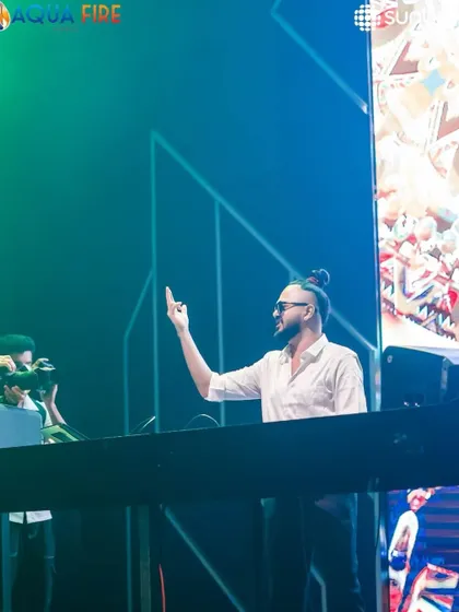 Pointing to the sky at Sunburn Union, feeling the energy.