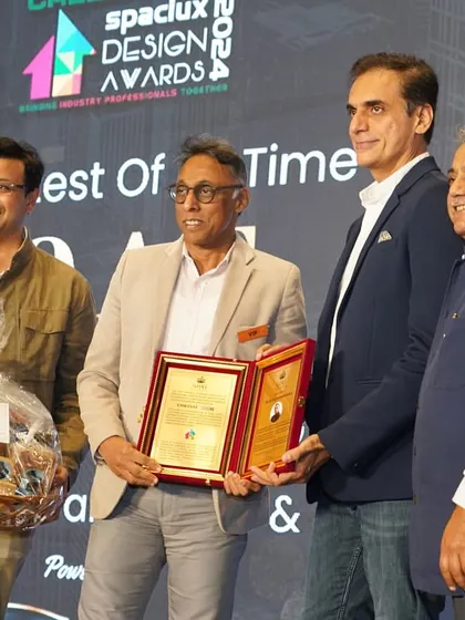 A moment of gratitude, holding the G.O.A.T. award plaque. This recognition belongs to our entire team, whose hard work and dedication make everything possible.