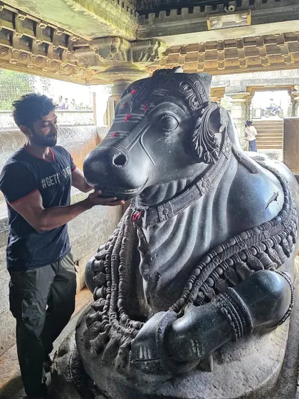 At the 12th-century Kedareshwara temple in Balligavi. This Hoysala-era temple has some of the most detailed and beautiful Nandi statues.