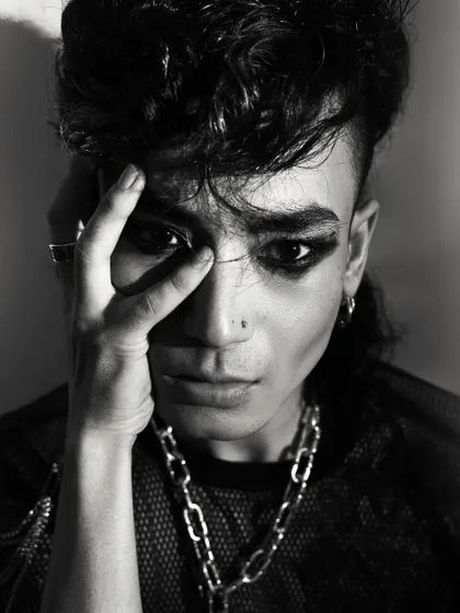 An edgy, punk-inspired black and white headshot. This showcases a very specific character type, demonstrating the model's versatility.