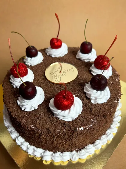 A Memory-Lane Black Forest cake ready for a birthday celebration. It's the perfect blend of nostalgia and high-quality ingredients.