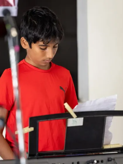 Another shot of our focused keyboard player, reading his sheet music as he performs for the residents.
