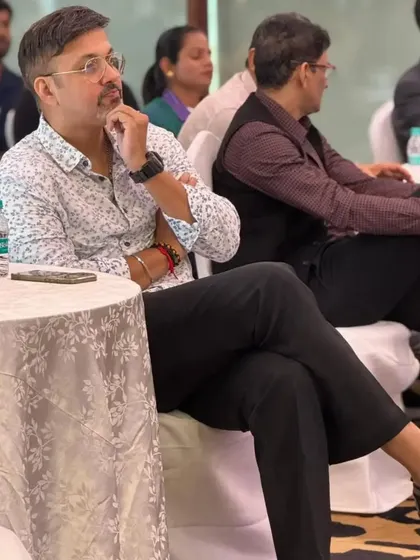 A candid moment of discussion during the conclave, where we explored important topics related to athlete well-being.