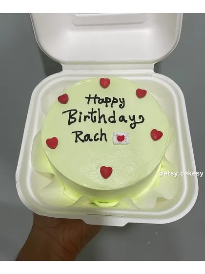 A light green bento cake with a personalized birthday message.