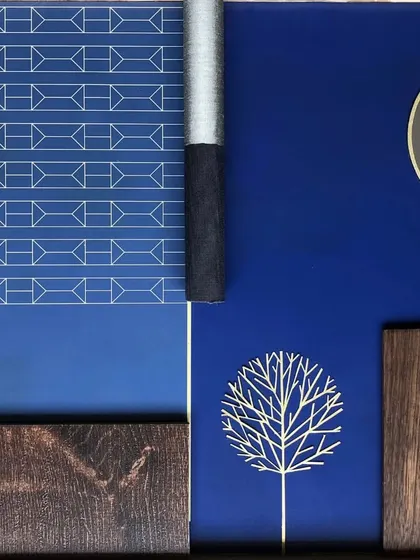The material and conceptual mood board for the spa, exploring a deep blue palette, dark wood, and the symbolic Bodhi tree motif to create a tranquil experience.