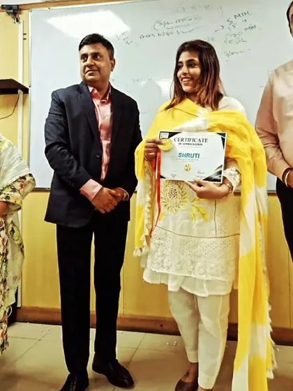 Proudly holding a certificate of achievement and a medal. These moments remind me of the standards I set for myself and for the legal service I provide.