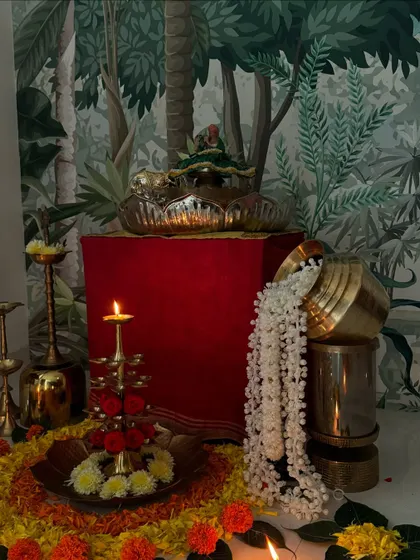 Sree Krishna Janmashtami ki shubhkamnayein. A beautiful setup for my Kanha ji, with a flower rangoli and a brass diya stand.
