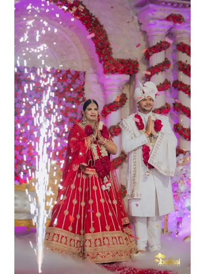The couple's grand entrance, with sparklers creating a magical effect.