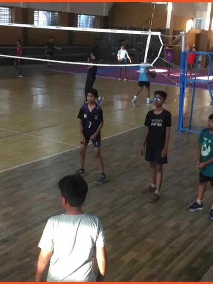 Players on the court during a practice game at the summer camp. This is where they apply the skills they learned in drills.