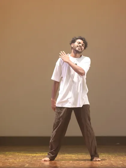 A relaxed and groovy pose from a freestyle performance, capturing the fun spirit of our Bollywood and hip-hop sessions.
