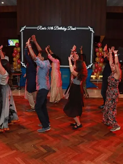The energy was amazing! A candid shot from the birthday flash mob, where guests of all ages joined in. This is what it's all about, creating moments of shared joy through dance.
