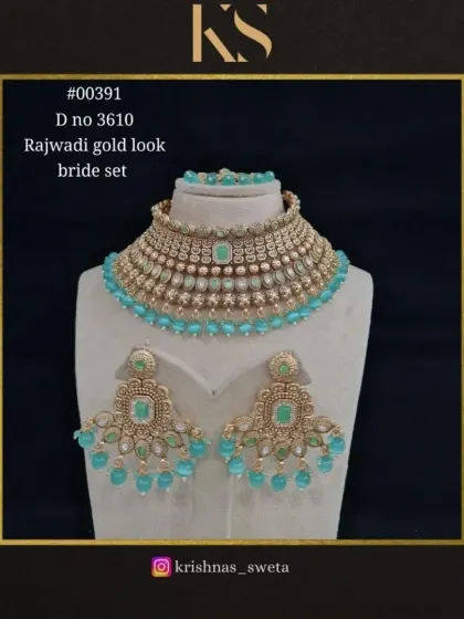 An exclusive Rajwadi gold-look bridal set with a beautiful mint blue color. This is a fresh and modern take on a classic design.