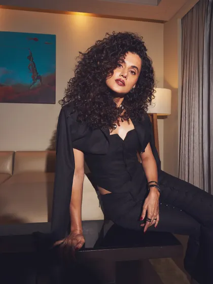 A confident and unconventional pose that perfectly matches Taapsee's personality. It shows how styling can be used to express character.