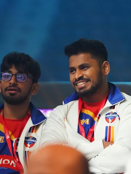 A candid moment on the sidelines during a Pro Kabaddi League match. Constant observation and analysis are part of ensuring players are performing optimally.