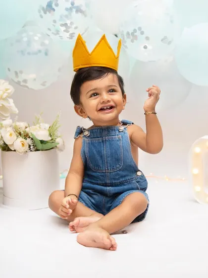 A first birthday is such a huge milestone. I love creating these bright, joyful setups to celebrate one whole year of your baby's personality, capturing their happy spirit as they officially become a toddler.