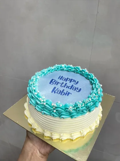 A custom birthday burn away cake is a fantastic way to celebrate. This one features a simple "Happy Birthday" message that gives way to a fun photo surprise.