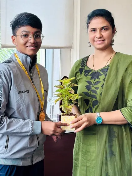 State silver medalist Riddhi Pawase with the Deputy Commissioner.