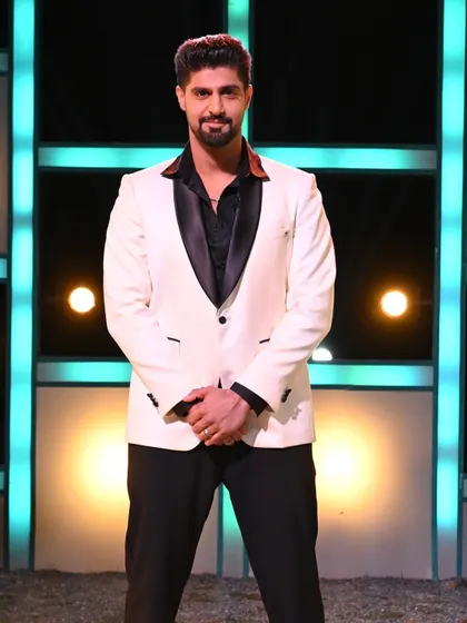 Tanuj Virmani sporting a classic white tuxedo jacket with a black satin lapel from our collection on MTV Splitsvilla.