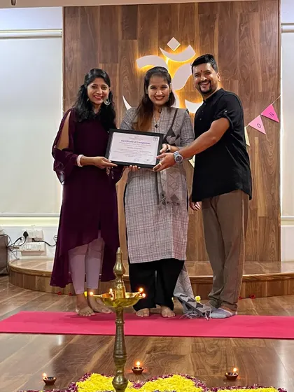 Another happy graduate receives her certification. These moments represent the beginning of a new chapter for our students as they step into the world as confident yoga teachers.