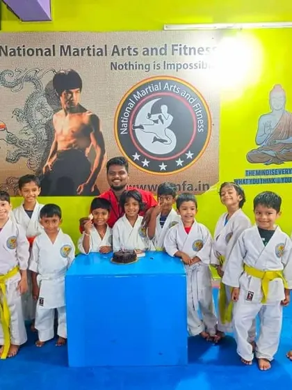 Our junior students celebrating their coach's birthday. We believe in fostering a sense of community and friendship from the very beginning.