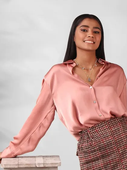 A commercial beauty shot often features a warm, friendly smile. This image captures a model's approachable look, perfect for lifestyle brands and commercial print work.