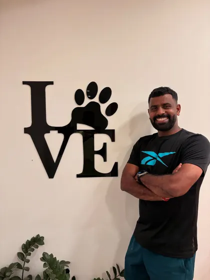 This "LOVE" sign with a paw print says it all. My love for dogs is a core part of who I am.
