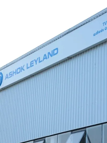 A close-up of the building's facade and signage. We use durable, high-quality materials like corrugated metal siding, suitable for industrial applications while maintaining a polished look.