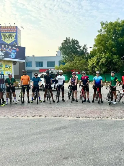 The group takes a break during the hot and humid 100km century ride. Hydration is key!