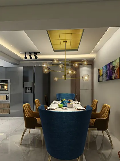 This dining room concept is ultra-chic, with a mix of royal blue and mustard yellow chairs. The gold-accented ceiling and modern chandelier add a lot of panache.