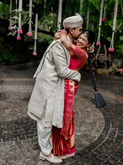A candid moment of pure laughter and joy. We love capturing the uninhibited happiness of our couples, creating photos that are full of life and energy.
