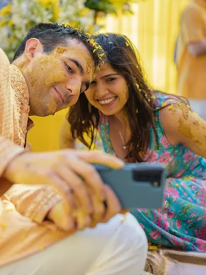 Even in the middle of their Haldi, they find a moment for a selfie. A modern touch to a traditional ceremony.