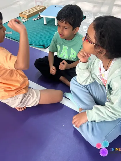 Another view of children in conversation, highlighting the importance we place on social and emotional development alongside academics.