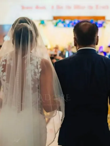 This view from behind the bride and her father as they walk down the aisle shows the perspective of the guests. We ensure the aisle decor, seating, and lighting all contribute to making this a beautiful and heartfelt procession.