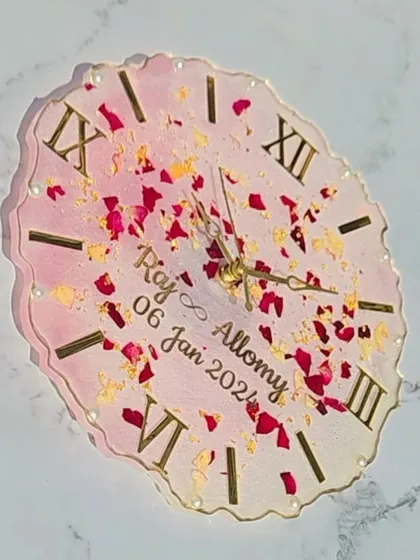 This 10-inch varmala wall clock is a perfect blend of love and art. I can custom-make these with your actual wedding garland, creating a durable and shiny keepsake of your special day.