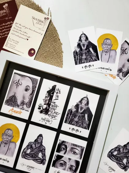 A close-up of the framed postcard collection, showing the detail in each small sketch and my business card, which shares a bit of my story.
