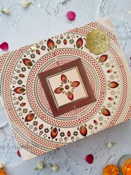 This traditional mandala-patterned box is one of my most popular packaging options for Diwali. It's sturdy, beautiful, and can be filled with a custom selection of my eggless treats.