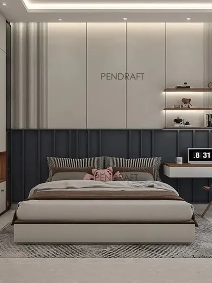 We designed this bedroom for two young boys using an indigo blue, grey, and white color theme. The layout includes a long bed with an integrated study desk.