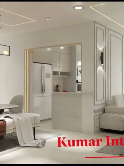 An open-concept living area where the kitchen, dining, and living spaces flow into one another. We used consistent design elements like the white and neutral color scheme to create a unified and spacious feel.