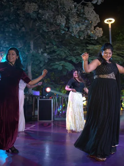 A fun shot of the 'Girl Tribe' in action during a sangeet performance.