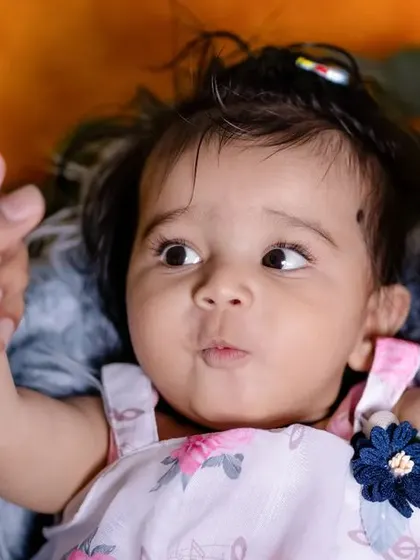Chubby cheeks and curious eyes. We love capturing these close-up portraits full of personality.