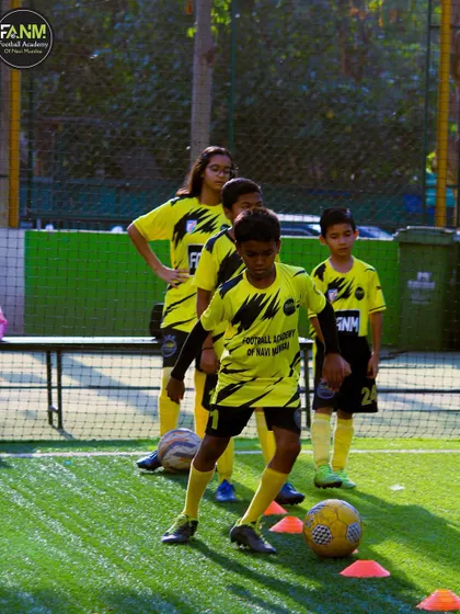 Players line up for a cone drill, showing the organized and structured approach I take to training sessions.