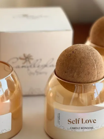 My "Self Love" candle comes in a beautiful amber canister jar with a cork lid. It's a luxurious blend of rose, jasmine, and vanilla.