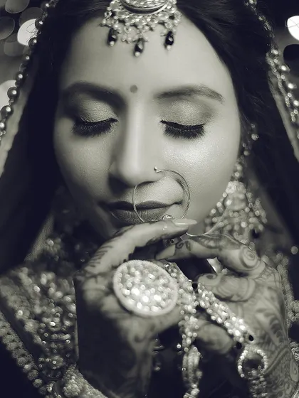 A timeless black and white version of a bridal close-up, emphasizing emotion and detail.