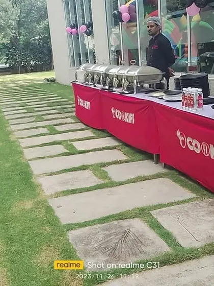 An outdoor catering setup for a kid's birthday party. We can arrange our services in any space, including lawns and clubhouses, to match your event's needs.