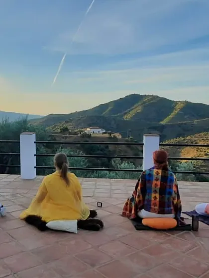Students engage in morning meditation at our retreat in Málaga, Spain. We practice in serene natural settings, allowing the beauty of the surroundings to quiet the mind and deepen the meditative experience.