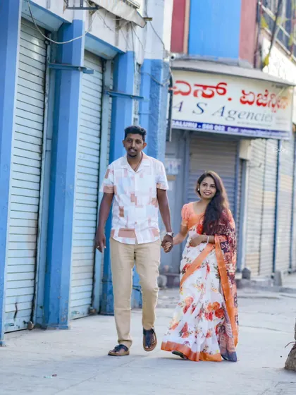 A candid shot of a couple walking through the old streets of Bangalore. This captures a slice of life and tells a story of their city.