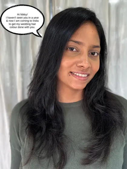A client testimonial shot. She came all the way to India for her wedding hair color, trusting us to create the perfect look for her big day.