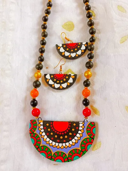 These are additional images and videos showing the wide assortment of necklace sets in various designs and colors that I have available for wholesale.