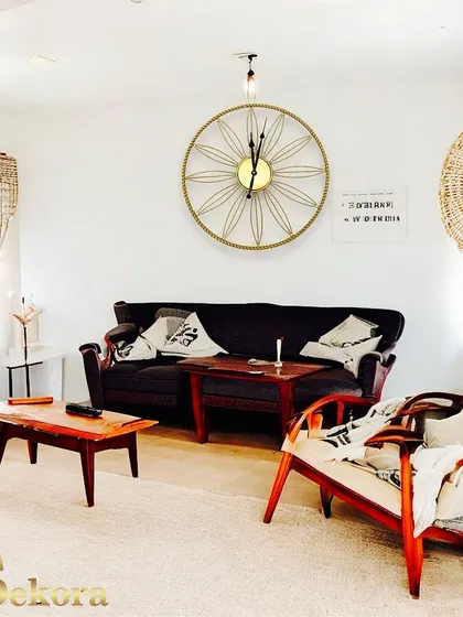 This creative wall clock, shown in a cozy living room, adds a light and airy feel.